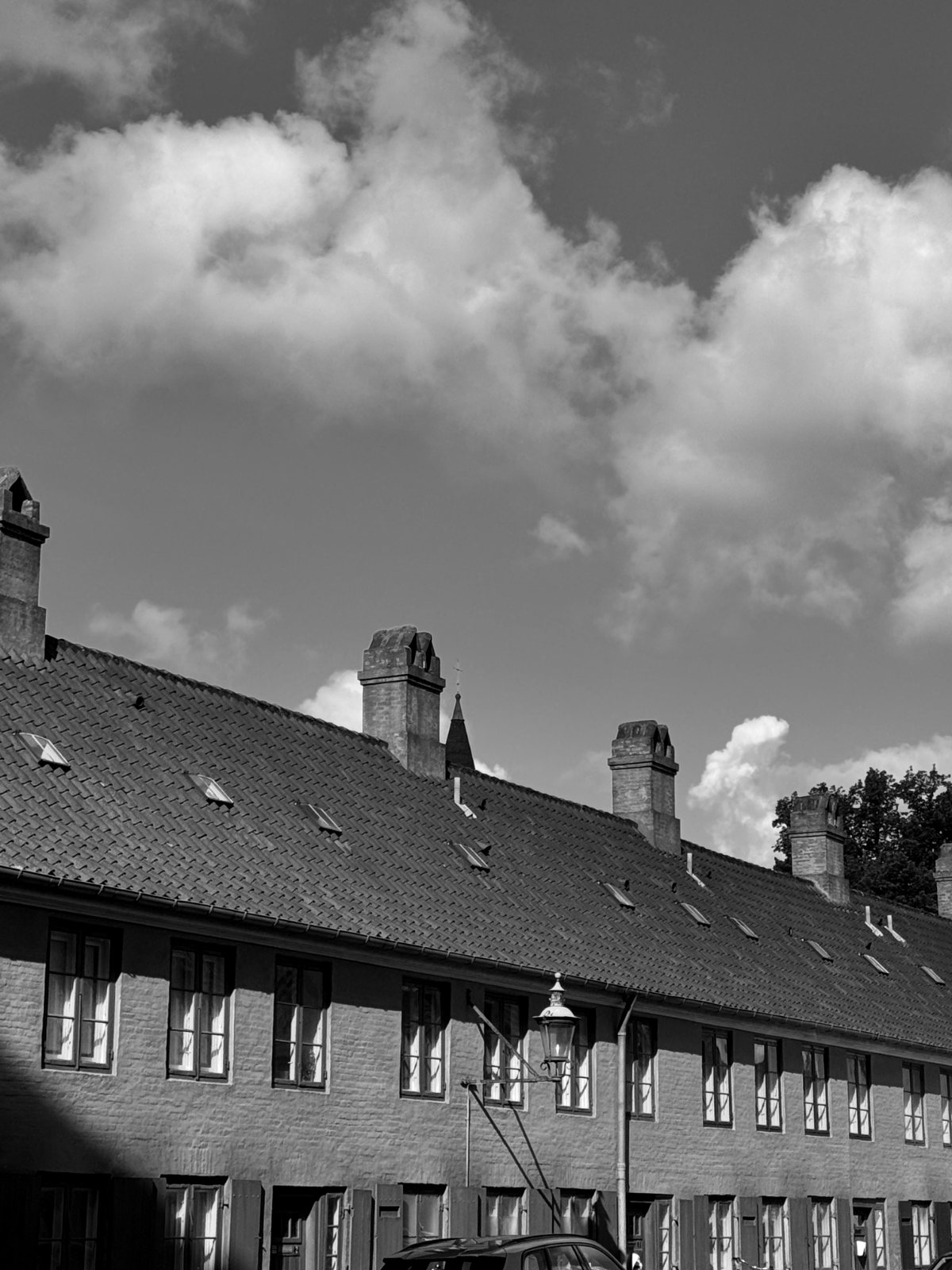 The yellow row houses of Nyboder — black and white